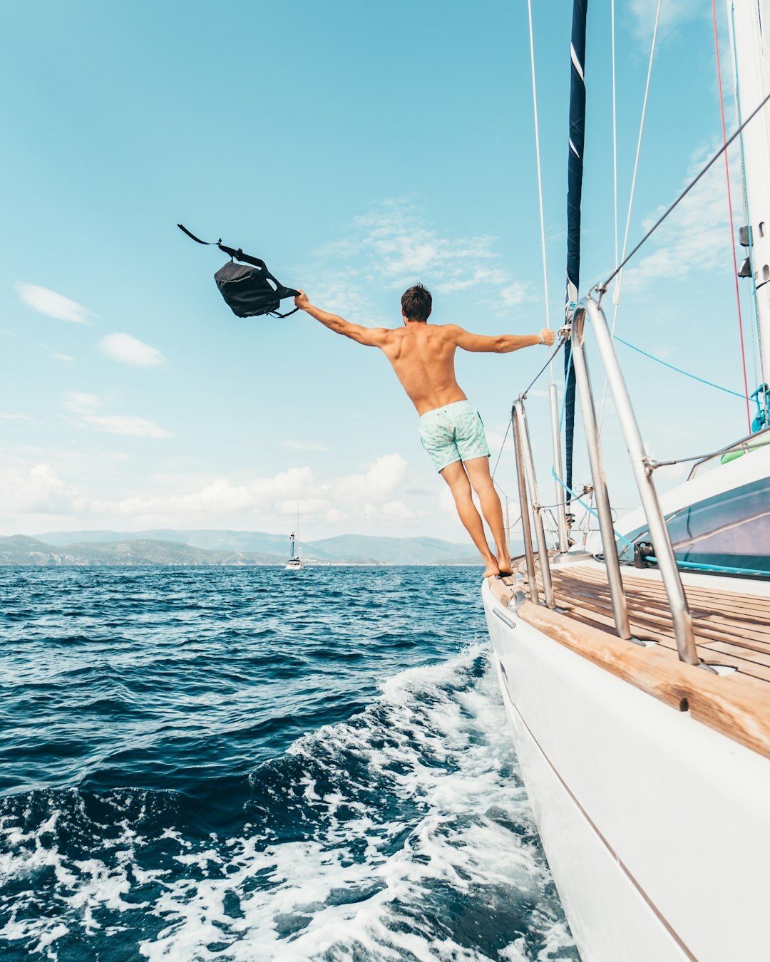 Polarized luxury sunglasses on a sailboat deck